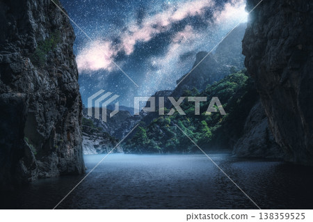 Milky Way over the beautiful mountain canyon and sea at night Milky Way over the beautiful mountain canyon and sea at night 138359525
