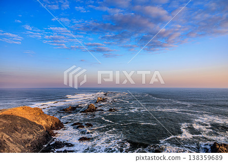Cape Erimo bathed in the sunset and the rugged landscape of the Pacific Ocean Cape Erimo bathed in the sunset and the rugged landscape of the Pacific Ocean 138359689