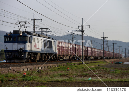 EF641024 container freight train running on the Hakubi Line EF641024 container freight train running on the Hakubi Line 138359878