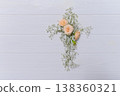 Delicate white gypsophila flowers forming a christian cross symbol faith, resurrection on a textured gray copy space surface. A spiritual concept for easter celebrations 138360321
