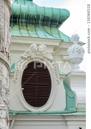 Facade details on Karlskirche baroque church in Karlsplatz square in Vienna, Austria Facade details on Karlskirche baroque church in Karlsplatz square in Vienna, Austria 138360528