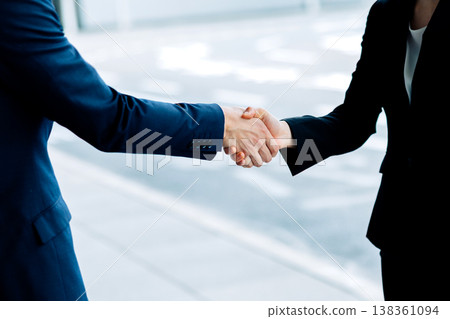 Business greetings, handshake. "Filming assistance: Kansai International Airport (KIX)" 138361094