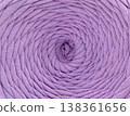 Textured cotton tape  background, rows of yarn for knitting forming geometric patterns and curves. 138361656