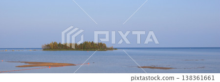 Golden trees on a small island, dreamlike autumn and sand beach, Vita Sannar, Sweden. Golden trees on a small island, dreamlike autumn and sand beach, Vita Sannar, Sweden. 138361661