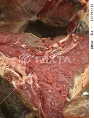 Fiorentina steak beefsteak detail in florence restaurant Fiorentina steak beefsteak detail in florence restaurant 138362845