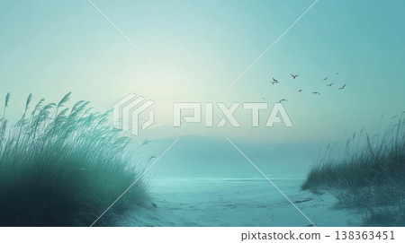 Birds Fly Over a Misty Beach at Sunrise with Coastal Grasses and Serene Nature's Embrace 138363451