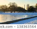 Capitol Reflecting Pool frozen in winter with Washington Monument obelisk at the background 138363564
