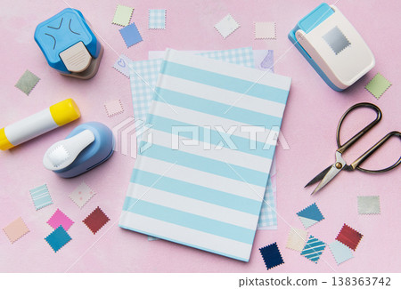 Scrapbooking craft supplies with notebook and punches Scrapbooking craft supplies with notebook and punches 138363742