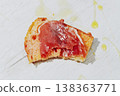 a bitten slice of pa amb tomaquet with ham 138363771