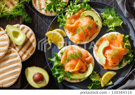 smoked salmon and avocado on grilled pita bread smoked salmon and avocado on grilled pita bread 138364318