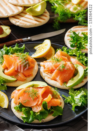 smoked salmon and avocado on grilled pita bread smoked salmon and avocado on grilled pita bread 138364322