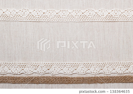 Lace frame on linen cloth background Lace frame on linen cloth background 138364635