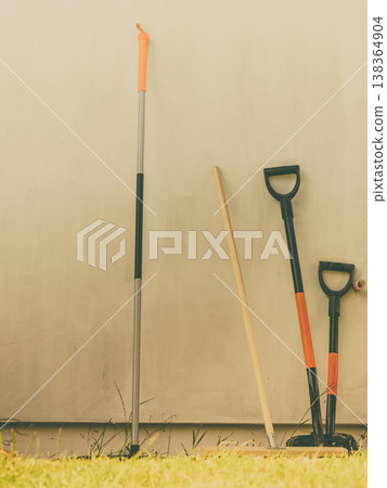 Shovel spade standing outside. 138364904