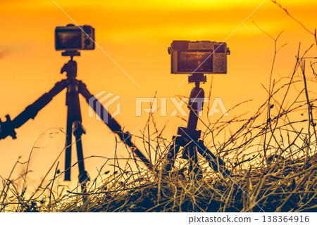 Camera taking picture film of sunrise 138364916