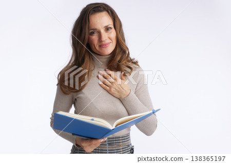 Grateful Professional Woman with Blue Notebook Grateful Professional Woman with Blue Notebook 138365197
