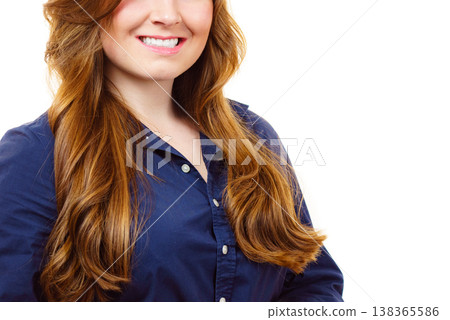 Smiling woman with long healthy brown hair Smiling woman with long healthy brown hair 138365586