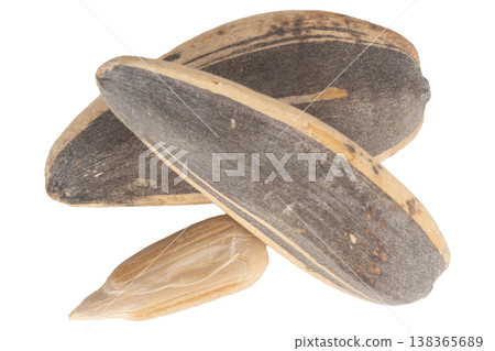 Sunflower seeds pile isolated on white background 138365689