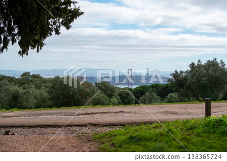 Scenic park view overlooking a city, river, and bridge Scenic park view overlooking a city, river, and bridge 138365724