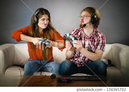 Pc gamer man and woman with game pad Pc gamer man and woman with game pad 138365782