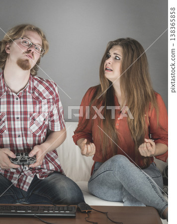 Woman is angry at playing man Woman is angry at playing man 138365858