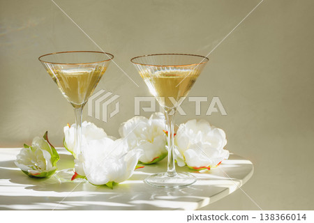 Champagne Glasses with White Peonies. Birthday or Wedding Celebration Arrangement. Champagne Glasses with White Peonies. Birthday or Wedding Celebration Arrangement. 138366014