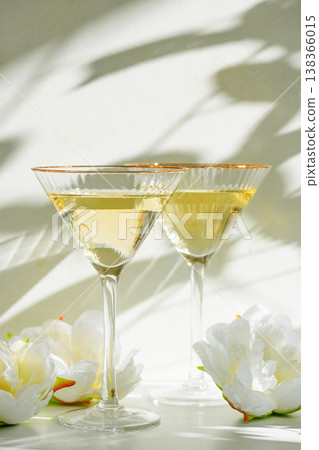 Champagne Glasses with White Peonies. Birthday or Wedding Celebration Arrangement. Champagne Glasses with White Peonies. Birthday or Wedding Celebration Arrangement. 138366015
