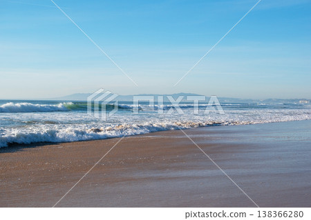 Ocean Surf Crashing Under Cliffside Beach in Daylight Ocean Surf Crashing Under Cliffside Beach in Daylight 138366280