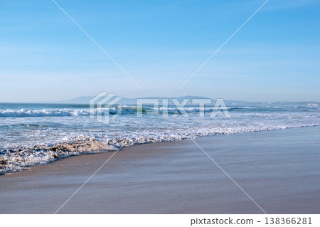 Coastal Cliff and Sea Waves Hitting Sandy Shore Coastal Cliff and Sea Waves Hitting Sandy Shore 138366281