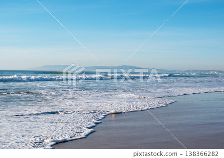 Scenic Cliff Beach with Rolling Ocean Waves Scenic Cliff Beach with Rolling Ocean Waves 138366282