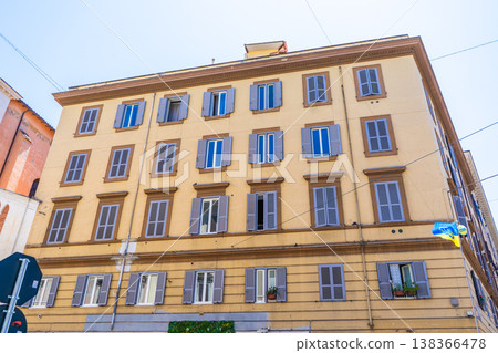 Italy Rome street house facade. Old building architecture in the city center. Italian window shutters Italy Rome street house facade. Old building architecture in the city center. Italian window shutters 138366478