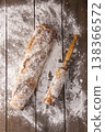 Freshly baked french baguette in on wooden background. High quality photo 138366572