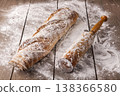 Freshly baked french baguette in on wooden background. High quality photo 138366580
