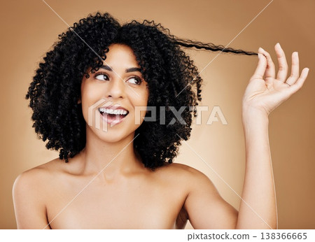 Curly hair, strand and woman in studio for beauty, healthy growth or natural coil textures on brown background. Happy model pull afro hairstyle for salon aesthetic, keratin treatment or cosmetic care Curly hair, strand and woman in studio for beauty, healthy growth or natural coil textures on brown background. Happy model pull afro hairstyle for salon aesthetic, keratin treatment or cosmetic care 138366665
