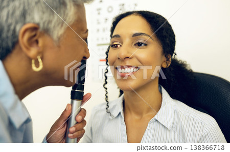 Woman, eye care and medical test with ophthalmoscope to check for glaucoma, ocular consulting and healthcare assessment. Clinic optician, eyesight and retina analysis of happy patient with lens tools 138366718