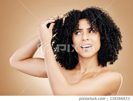 Hair, frustrated and woman with afro knots, frizz and isolated in a studio brown background with wellness and skincare. Comb, damage and confused person with cosmetic aesthetic in Brazil hairdresser Hair, frustrated and woman with afro knots, frizz and isolated in a studio brown background with wellness and skincare. Comb, damage and confused person with cosmetic aesthetic in Brazil hairdresser 138366833