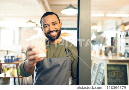 Portrait, happy man or barista with smile for coffee cup in hand for customer. African, person or employee of small business with order of cappuccino, latte or drink in store, cafe or shop for offer Portrait, happy man or barista with smile for coffee cup in hand for customer. African, person or employee of small business with order of cappuccino, latte or drink in store, cafe or shop for offer 138366879