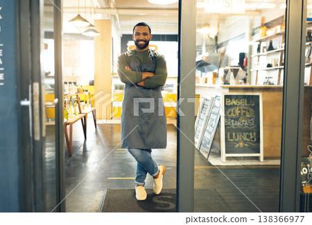 Happy man, portrait and professional in small business cafe with arms crossed in confidence or retail management. Male person, barista or waiter smile by entrance of coffee shop, store or restaurant 138366977
