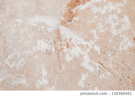 Close-up of natural stone texture with coral and ginger orange tones. Rough rocky surface pattern Close-up of natural stone texture with coral and ginger orange tones. Rough rocky surface pattern 138366981