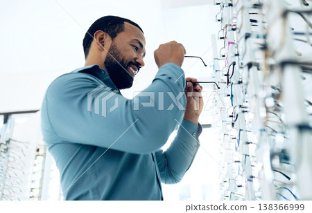 Optometry, vision and happy man with glasses for decision, choice and eye care option in optician store. Healthcare, ophthalmology and person in clinic for prescription lens, spectacles and frames Optometry, vision and happy man with glasses for decision, choice and eye care option in optician store. Healthcare, ophthalmology and person in clinic for prescription lens, spectacles and frames 138366999