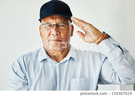 Old man, salute and portrait for veteran soldier on white background for gratitude, pride or respect. Elderly male, army hero power and military or hand gesture for patriotic courage, war or service 138367029