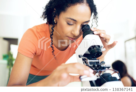 Ophthalmology, woman on microscope and glasses for calibration, exam and frame correction. Diopter instrument, spectacles and serious optometrist test lens for vision, health and inspection in clinic Ophthalmology, woman on microscope and glasses for calibration, exam and frame correction. Diopter instrument, spectacles and serious optometrist test lens for vision, health and inspection in clinic 138367141