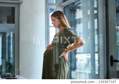 Woman, breathing or pregnant stomach in office break in business in workplace to relax body. Calm, worker or mom thinking of pregnancy in career, work or job with belly, affection or care for baby Woman, breathing or pregnant stomach in office break in business in workplace to relax body. Calm, worker or mom thinking of pregnancy in career, work or job with belly, affection or care for baby 138367187