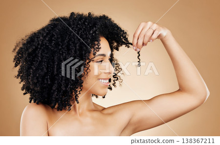 Hair, growth and woman with beauty and curls, smile with natural cosmetics and shine isolated on studio background. Texture, curly hairstyle with haircare and transformation, skin and cosmetology Hair, growth and woman with beauty and curls, smile with natural cosmetics and shine isolated on studio background. Texture, curly hairstyle with haircare and transformation, skin and cosmetology 138367211