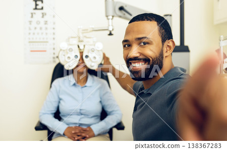 Man, eye exam and phoropter with optometrist, portrait and check with lens, vision and wellness in clinic. Doctor, eyesight tools and machine for assessment, consultation and healthcare in hospital 138367283