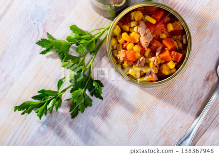 Opened can of Milanese salad 138367948