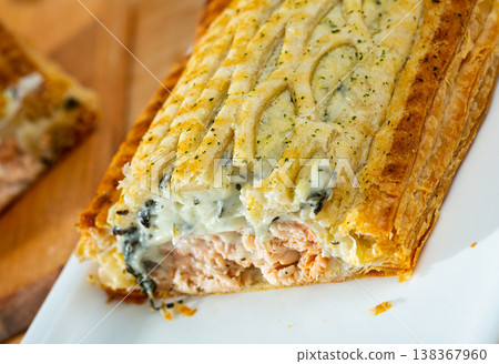 Puff pastry pie with salmon Puff pastry pie with salmon 138367960
