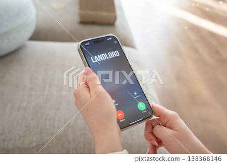 A phone call from a landlord signals rent changes and regulation updates. Tenant rights and housing policies evolve. Rising costs challenge affordability and stability in rental markets. 138368146