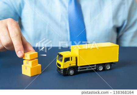 A truck and boxes represent delivery and transportation of goods. Logistics networks support global trade. Freight operations ensure timely distribution and supply chain optimization for businesses. A truck and boxes represent delivery and transportation of goods. Logistics networks support global trade. Freight operations ensure timely distribution and supply chain optimization for businesses. 138368164