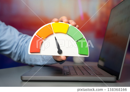 Below-average productivity on the rating meter signals performance decline. Workplace efficiency requires improvement strategies. Motivation and management tools help optimize output a 138368166