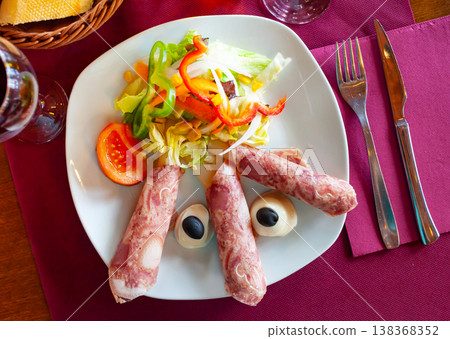 Tasty asparagus rolled with ham and vegetables salad Tasty asparagus rolled with ham and vegetables salad 138368352